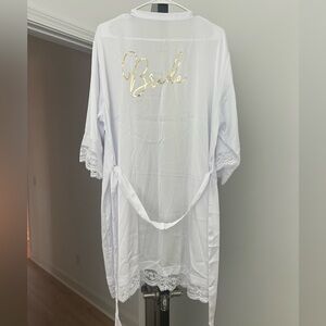 Brand new. Silk bride robe with gold foil print and lace. One size